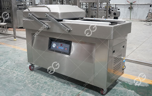 ماكينة تعبئة التمر بتفريغ الهواء (2).jpg ماكينة تعبئة التمر بتفريغ الهواء (2).jpg